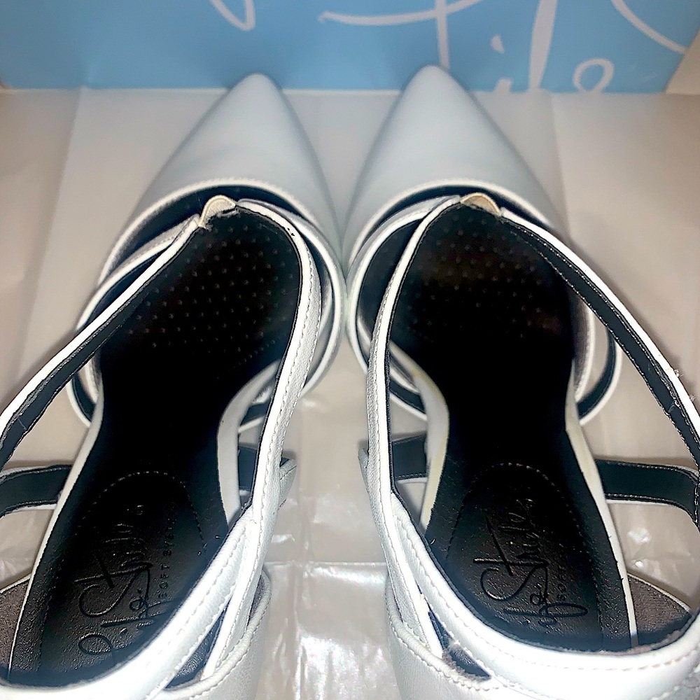 Never Worn & In Perfect Condition! These heels are a size 8.5 Wide.